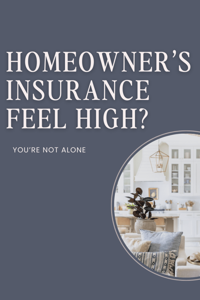 An image that shows a open concept living room from the angle in front of the couch looking at the large bright kitchen. 